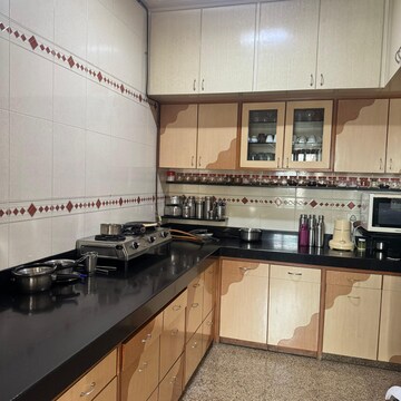 Kitchen in 3 BHK Apartment at Kalpataru Tarangan Shravan, Samata Nagar – for Rent