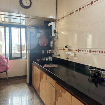 Kitchen in 3 BHK Apartment at Kalpataru Tarangan Shravan, Samata Nagar – for Rent