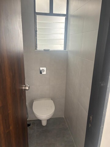 Bathroom in 1 BHK Apartment at Roshan Milestone, Tathawade – for Rent