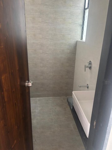 Bathroom in 1 BHK Apartment at Roshan Milestone, Tathawade – for Rent