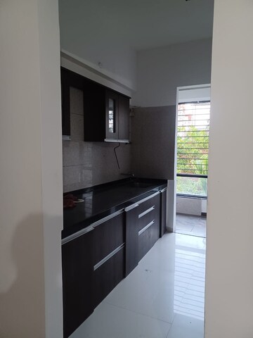 Kitchen in 2 BHK Apartment at Pinnacle Cottage Close, Sinhagad Road – for Rent