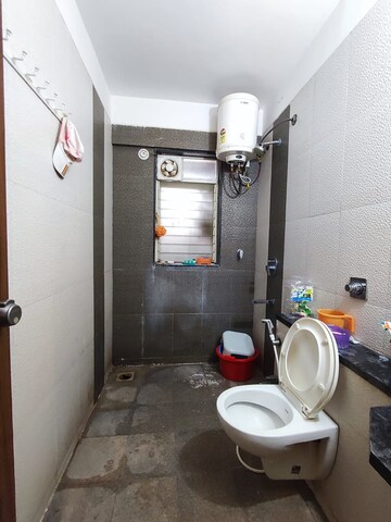 Bathroom in 2 BHK Apartment at Rawat Madhuli, Sinhagad – for Rent
