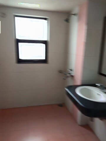Bathroom in 3 BHK Apartment at Omega I Greater Noida – for Rent