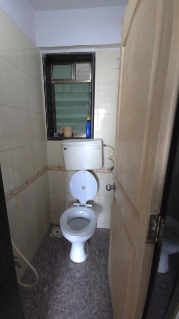 Bathroom in 1 BHK Apartment at Dindoshi Onkar CHS, Malad East – for Rent