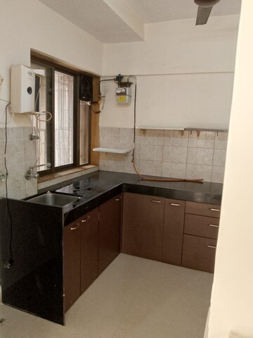 Kitchen in 2 BHK Apartment at Runwal Garden City, Balkum Pada – for Rent