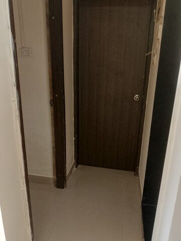 Building Lobby in 2 BHK Apartment at Runwal Garden City, Balkum Pada – for Rent