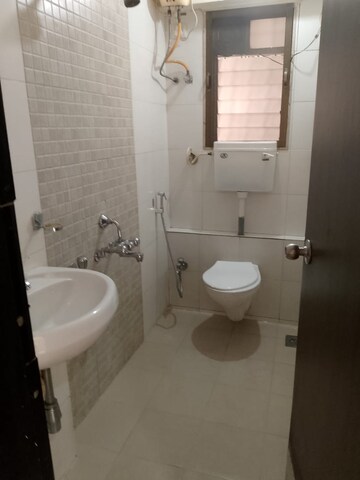 Bathroom in 2 BHK Apartment at Runwal Garden City, Balkum Pada – for Rent