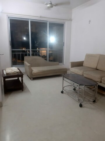 Living Room in 2 BHK Apartment at Lodha Aqua, Mira Road – for Rent