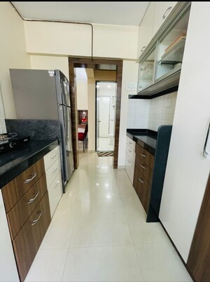 Kitchen in 2 BHK Apartment at Mahavir Kalpavruksha, Ghodbunder Road – for Sale