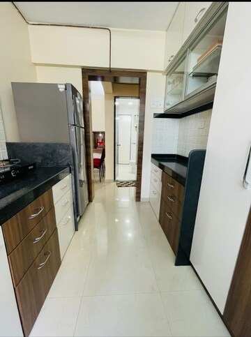 Kitchen in 2 BHK Apartment at Mahavir Kalpavruksha, Ghodbunder Road – for Sale