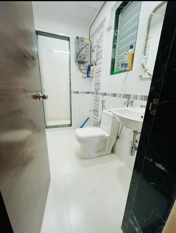Bathroom in 2 BHK Apartment at Mahavir Kalpavruksha, Ghodbunder Road – for Sale