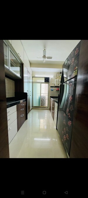 Kitchen in 2 BHK Apartment at Mahavir Kalpavruksha, Ghodbunder Road – for Sale