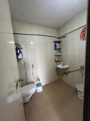 Bathroom in 2 BHK Apartment at Marigold CHS Anand Nagar, Anand Nagar – for Sale