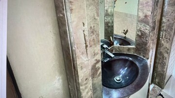 Bathroom in 2 BHK Apartment at Buniyad CHS, Aarey Colony – for Sale