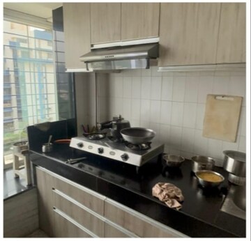 Kitchen in 4 BHK Apartment at Sanjeev Enclave, Andheri West – for Rent