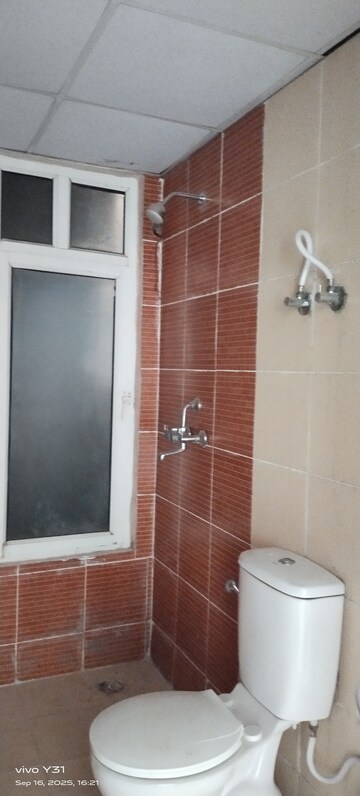 Bathroom in 2 BHK Apartment at Mahagun Mywoods, Sector 16c Greater Noida – for Rent