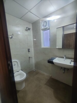 Bathroom in 2.5 BHK Builder Floor at Smart World Gems, Sector 89 – for Sale