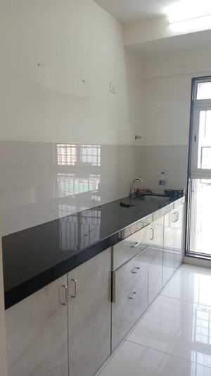 Kitchen in 1 BHK Apartment at Godrej Tranquil, Kandivali East – for Rent