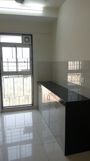 Kitchen in 1 BHK Apartment at Godrej Tranquil, Kandivali East – for Rent
