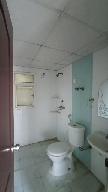 Bathroom in 3 BHK Apartment at Saviour Park, Mohan Nagar – for Rent