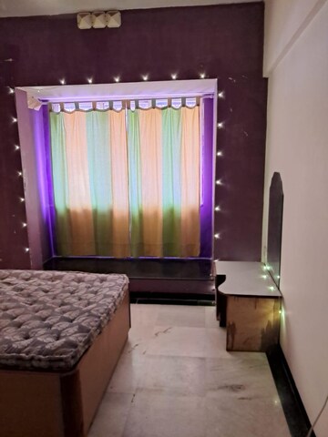 Bedroom in 2 BHK Apartment at Palace Orchard CHS, Mohammadwadi – for Rent