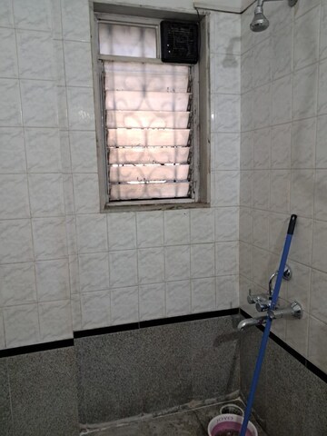 Bathroom in 2 BHK Apartment at Palace Orchard CHS, Mohammadwadi – for Rent