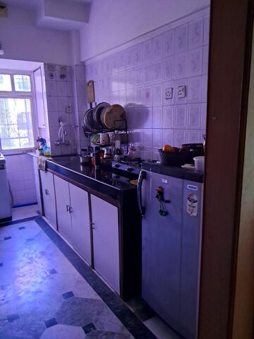 Kitchen in 2 BHK Apartment at Palace Orchard CHS, Mohammadwadi – for Rent