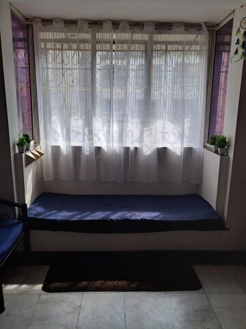 Living Room in 2 BHK Apartment at Palace Orchard CHS, Mohammadwadi – for Rent