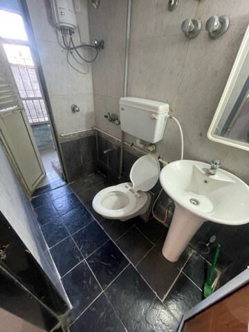 Bathroom in 1 BHK Apartment at Evershine Woods, Mira Road – for Sale