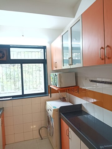 Kitchen in 1 BHK Apartment at Dheeraj Valley, Goregaon East – for Rent