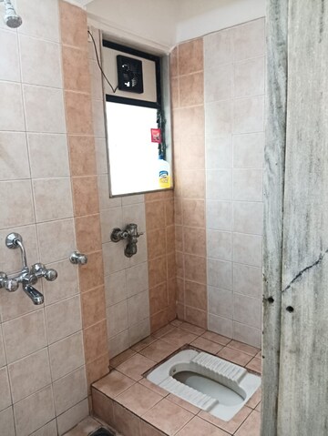 Bathroom in 1 BHK Apartment at Dheeraj Valley, Goregaon East – for Rent