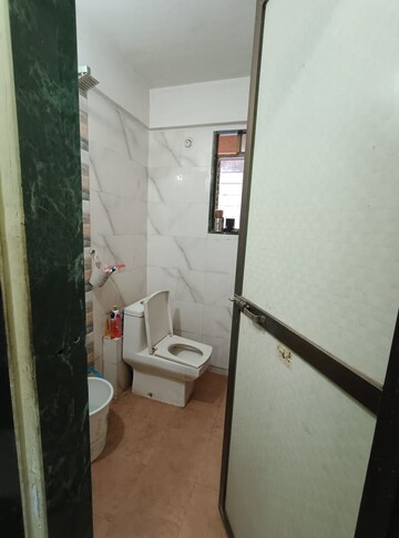 Bathroom in 2 BHK Apartment at Kopar Khairane – for Rent