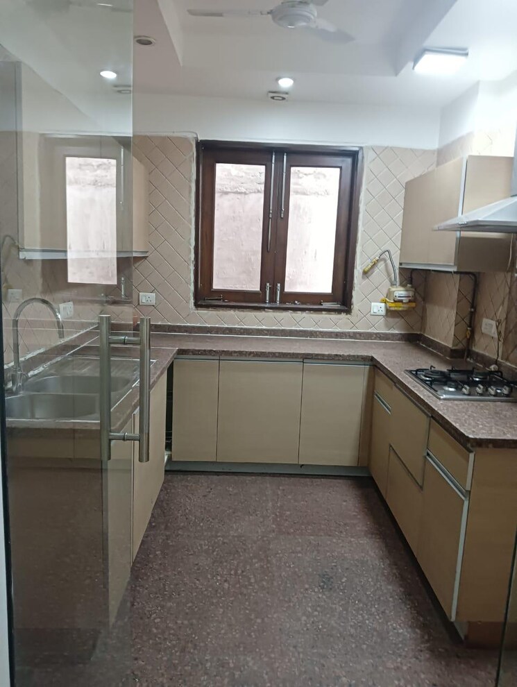 Kitchen, uday park 3 Bedroom 217 Sq.Yd. Builder Floor In Uday Park Delhi 9196461