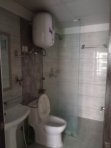 Bathroom in 2.5 BHK Apartment at Gulshan Bellina, Sector 16 Greater Noida – for Rent
