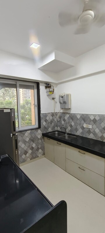 Kitchen in 3 BHK Apartment at Jainam Elysium, Bhandup West – for Rent
