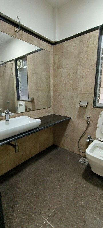 Bathroom in 3 BHK Apartment at Jainam Elysium, Bhandup West – for Rent