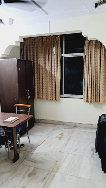 Living Room in 1 BHK Apartment at Gokuldham Complex, Goregaon East – for Rent