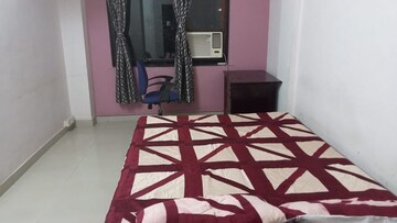 Bedroom in 2 BHK Apartment at New Mhada Towers, Andheri West – for Rent
