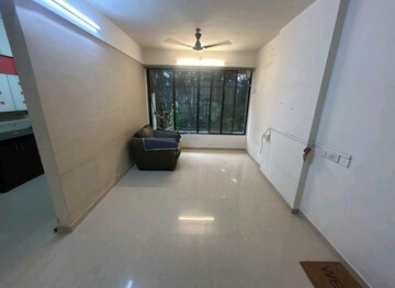 Living Room in 2 BHK Apartment at Miraj Residency, Malad West – for Rent