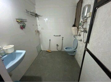 Bathroom in 2 BHK Apartment at Miraj Residency, Malad West – for Rent