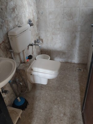 Bathroom in 1 BHK Apartment at Raunak Unnathi Greens, Kasarvadavali – for Sale