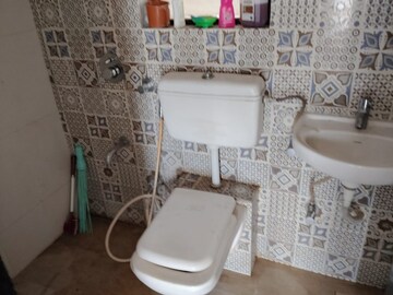 Bathroom in 1 BHK Apartment at Raunak Unnathi Greens, Kasarvadavali – for Sale