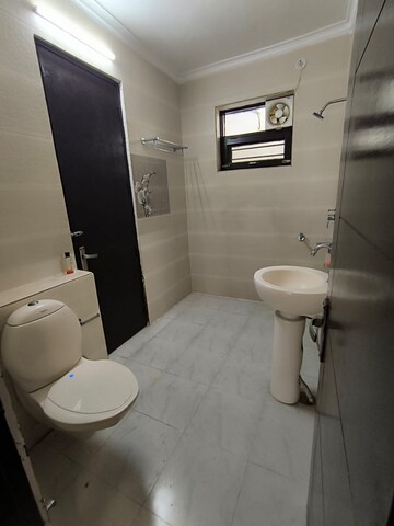 Bathroom in 4 BHK Builder Floor at Green Fields Colony – for Rent