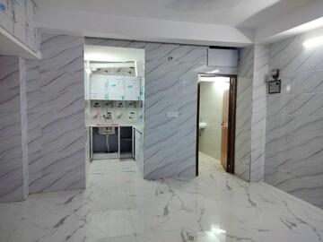Building Lobby in 2 BHK Apartment at Sarita Vihar – for Rent