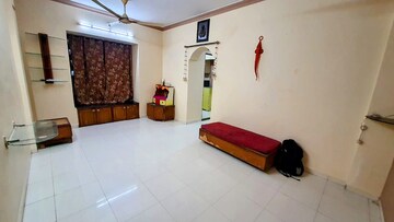Living Room in 1 BHK Apartment at Raunak Bliss, Ghodbunder Road – for Rent