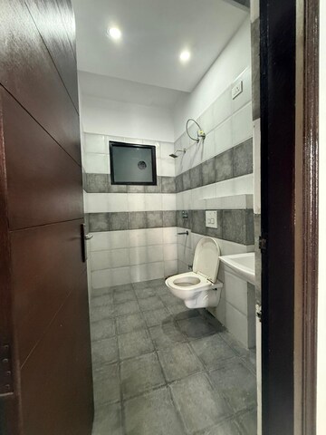 Bathroom in 3 BHK Apartment at Dhakoli – for Sale