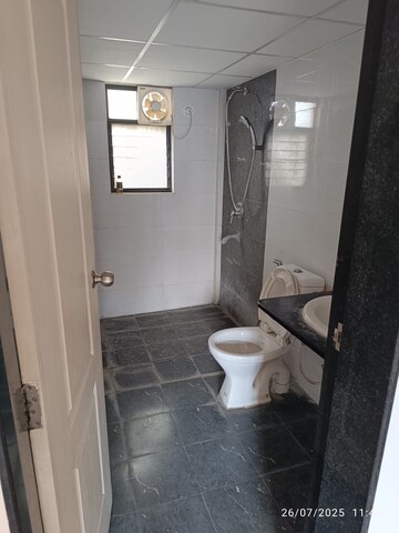 Bathroom in 2 BHK Apartment at Kolte Patil Margosa Heights, Mohammadwadi – for Rent
