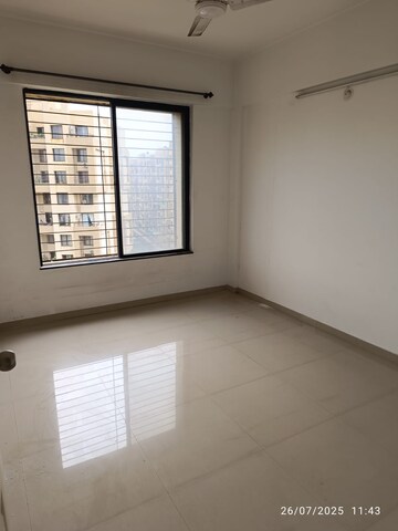 Bedroom in 2 BHK Apartment at Kolte Patil Margosa Heights, Mohammadwadi – for Rent