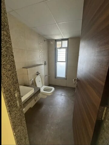 Bathroom in 3 BHK Apartment at K Raheja Reserve, Mohammadwadi – for Rent