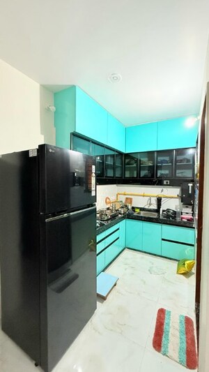 Kitchen in 2 BHK Apartment at Gandevi Road – for Sale